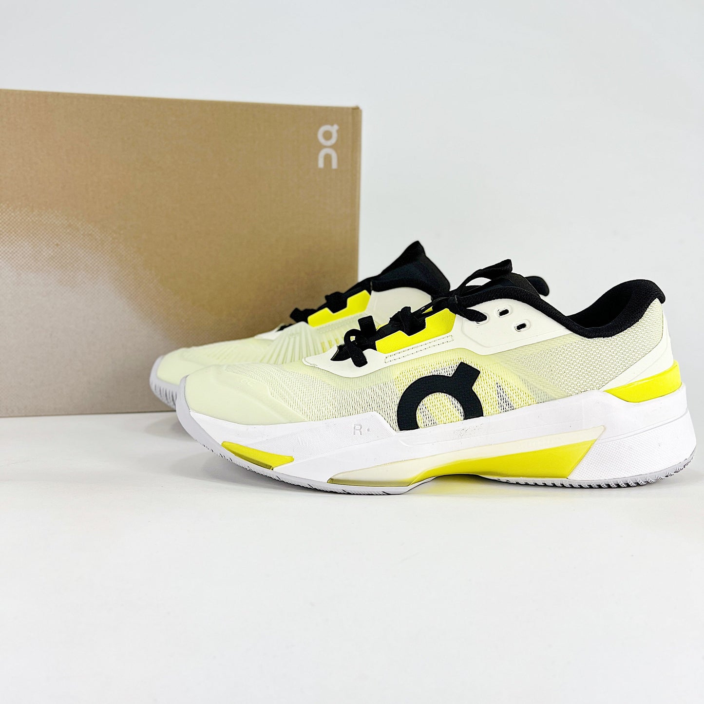 On The Roger Pro Fire – Ivory White & Neon Yellow Unisex Breathable Anti-Slip Tennis Shoes